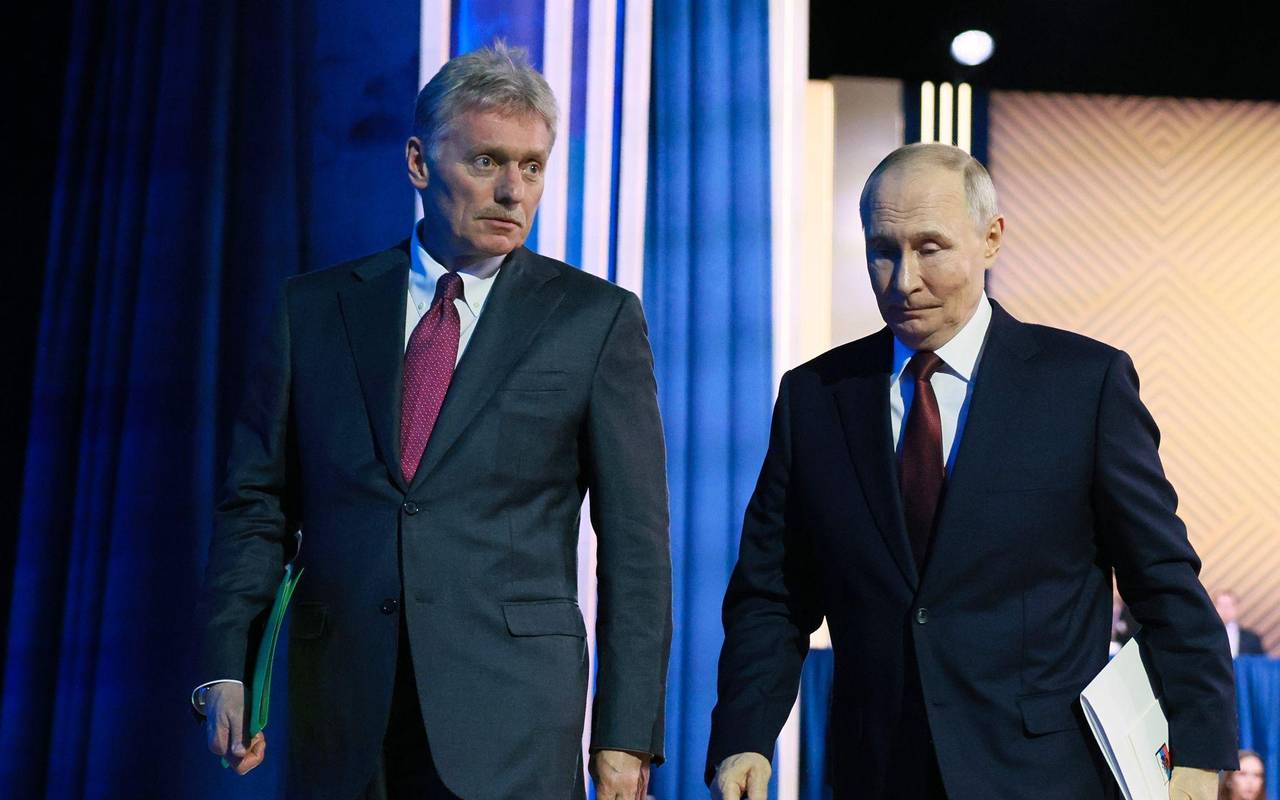 Putin und sein Pressesprecher Peskow