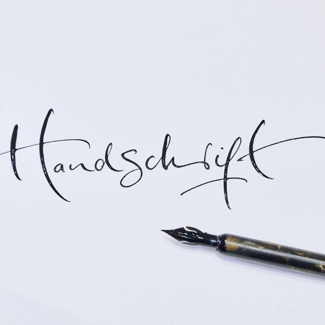 Das Wort «Handschrift» steht auf einem Blatt Papier