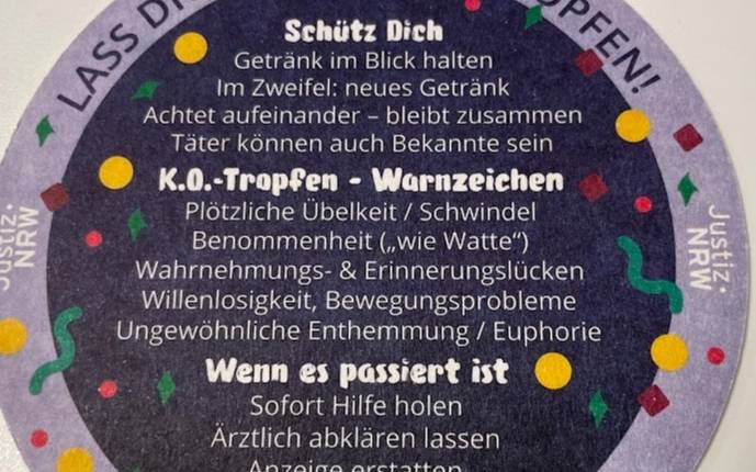 Die wichtigste Hinweise zum Schutz gegen K.O.-Tropfen auf einem Bierdeckel
