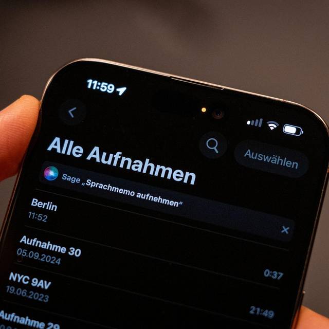 Eine orangefarbene Statusanzeige eines iPhones